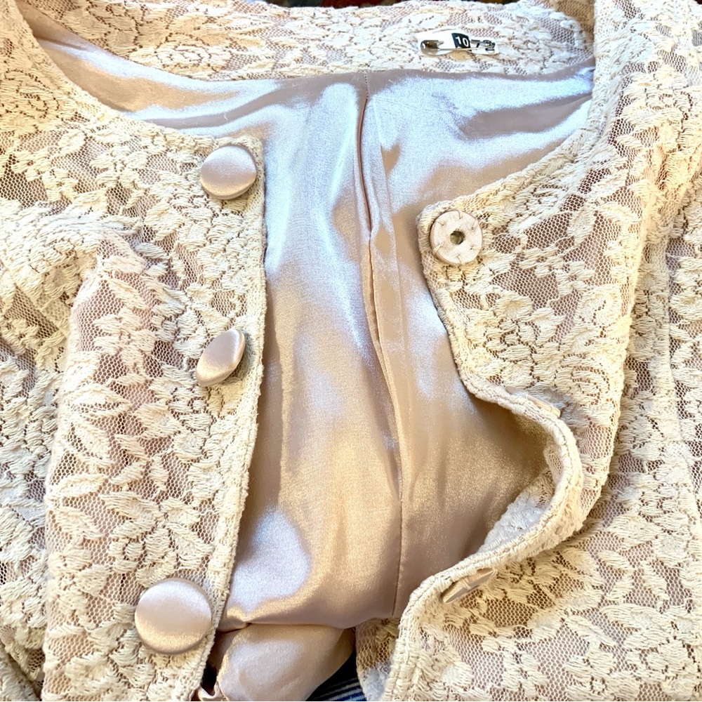 Elegant Cream Lace Coat with Blush Lining